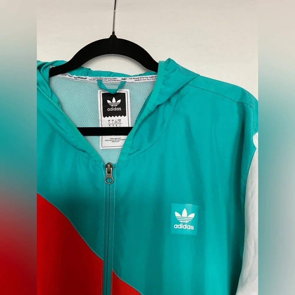 Adidas Orange and White Windbreaker with Modern Color-Block Design